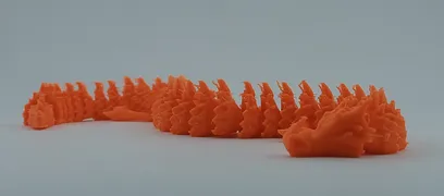 Dragão articulado cor de laranja impresso em 3D